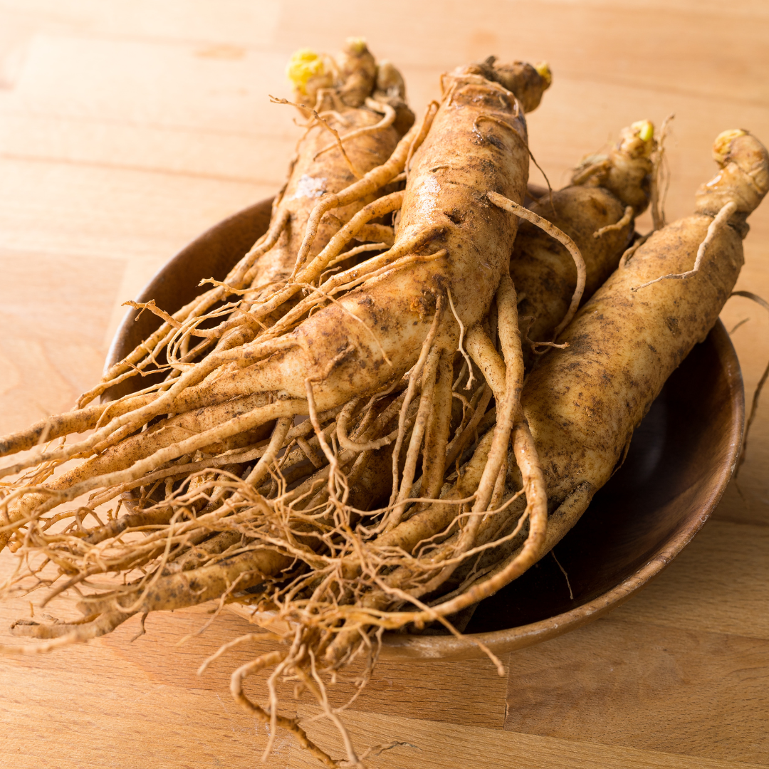 a bunch of ginseng inside a wooden bowl
