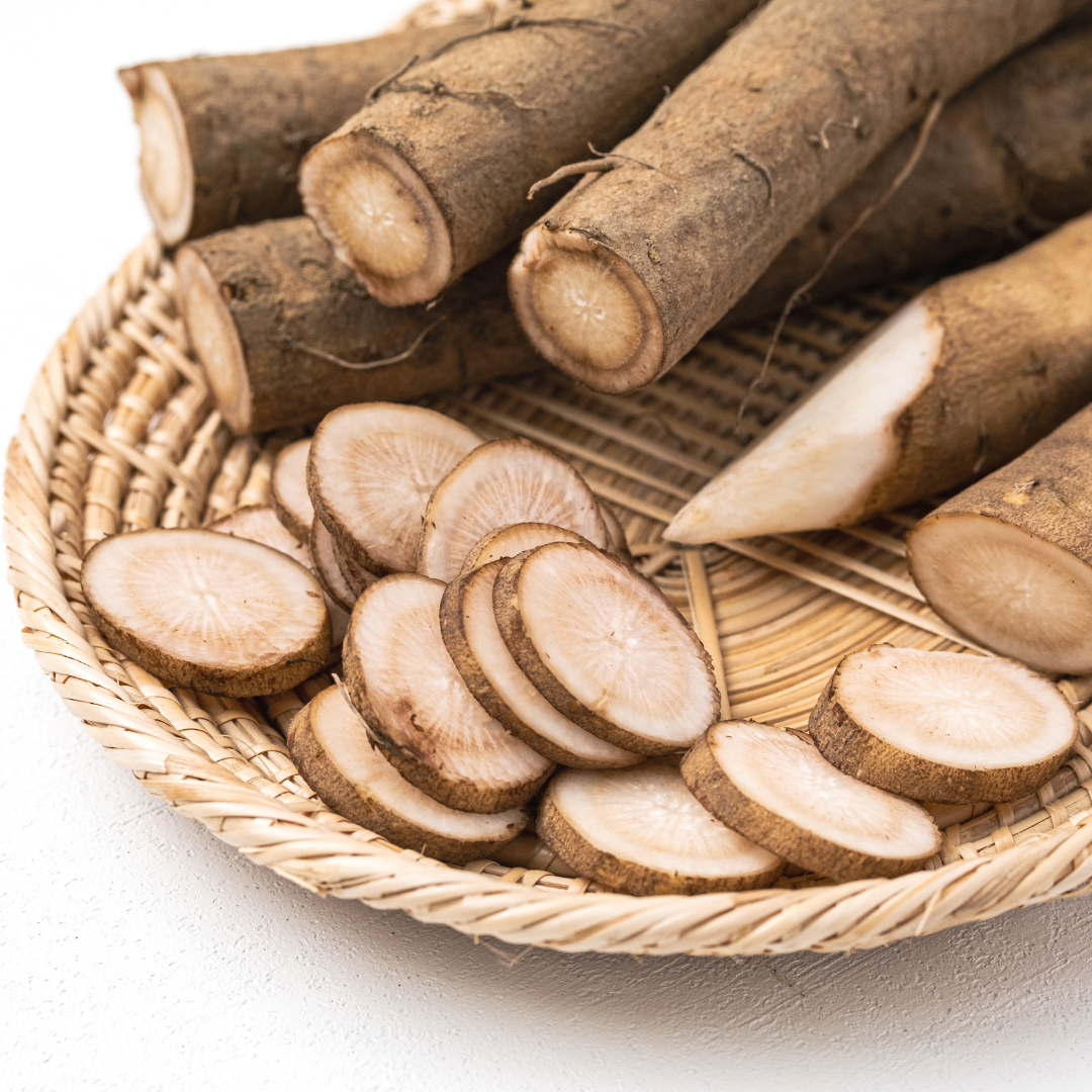 Burdock roots on a woven plate