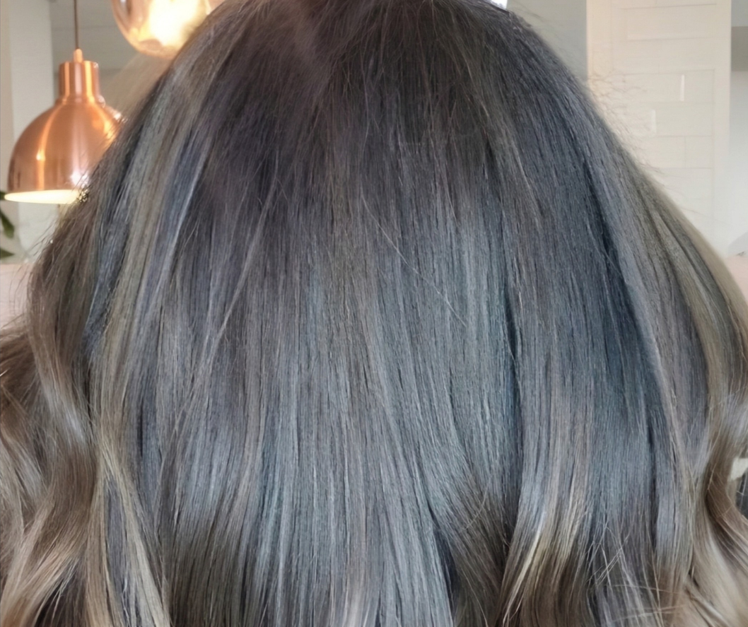 Close-up of gray hair with a blurred background