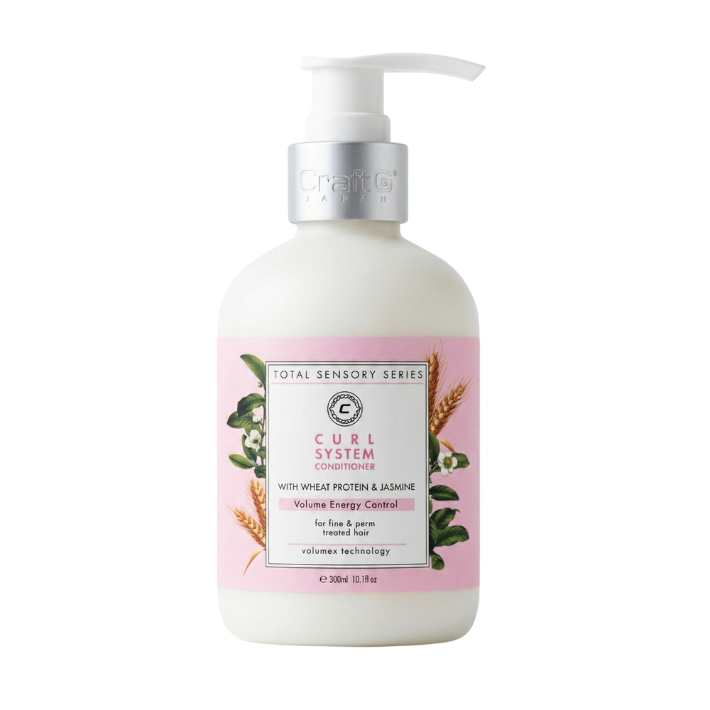White bottle of 'Total Sensory Series' Curl System Conditioner with pink label on a white background