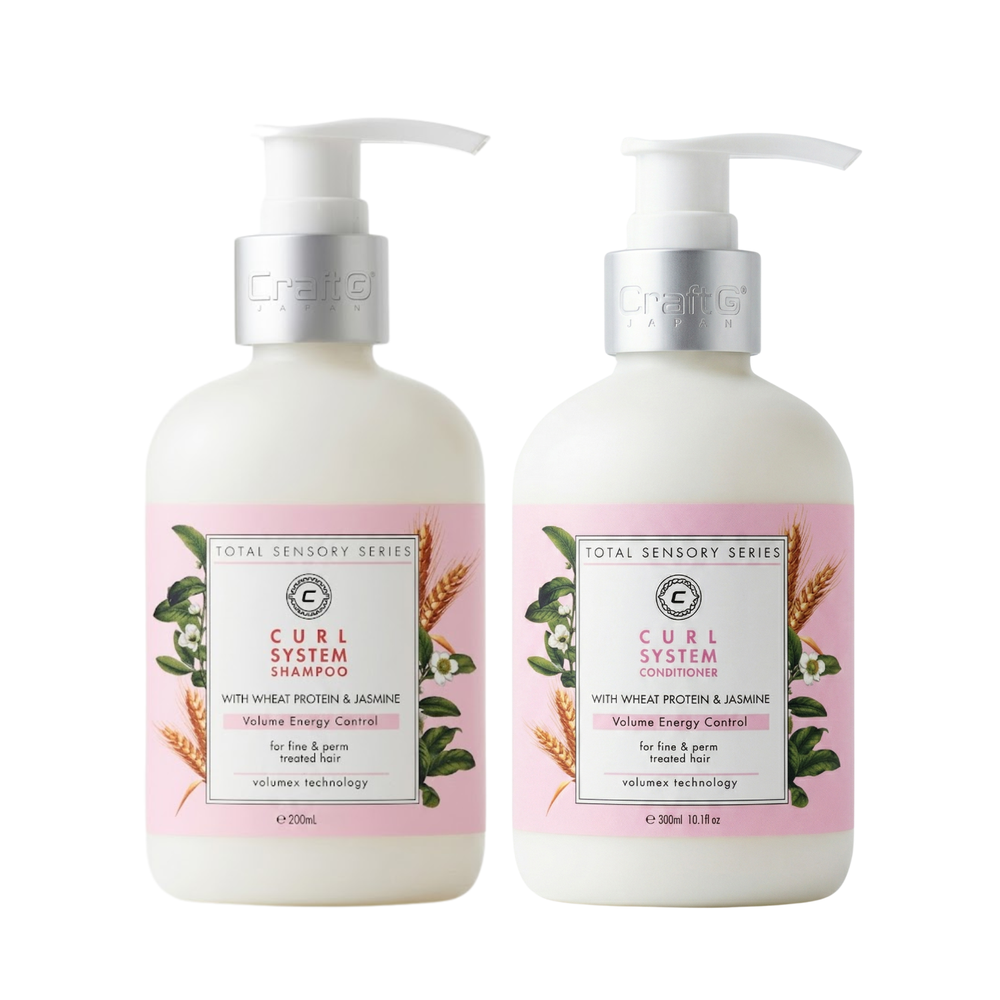 Two bottles of Curl System shampoo and conditioner on a white background
