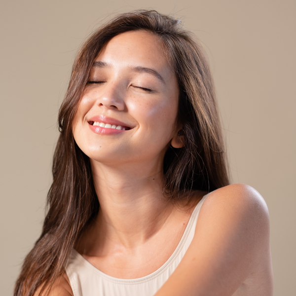 a woman looking up smiling