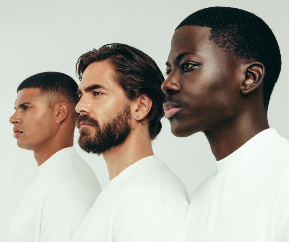 three men looking to the left